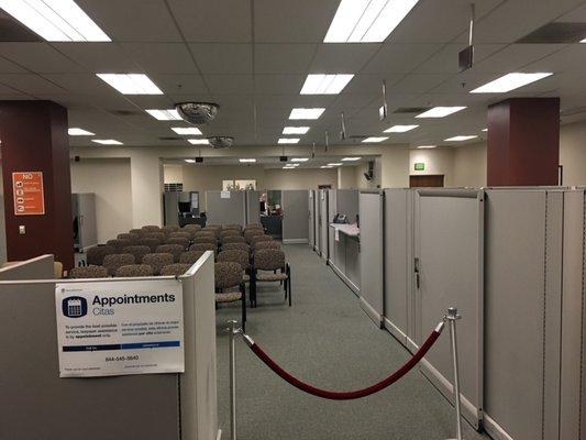 Appointments only. Call in only. Empty room. A dozen idle IRS employees. 30m on hold so far.