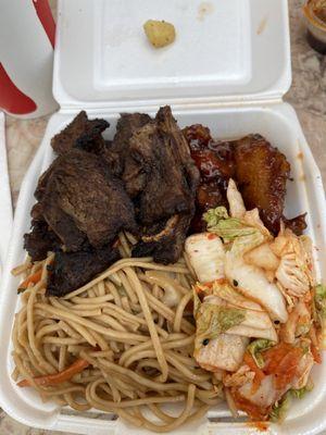 Short ribs, Korean chicken wings, noodles, and kimchi