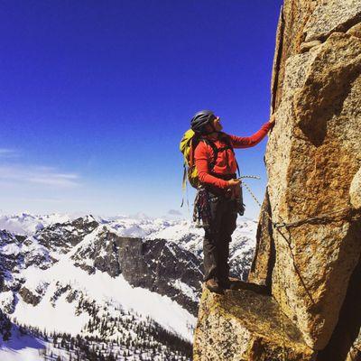 A climber on the Beckey Route on Liberty Bell. This is a common objective on Pacific Northwest programs.