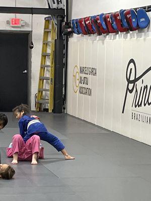 Kids drilling knee on belly