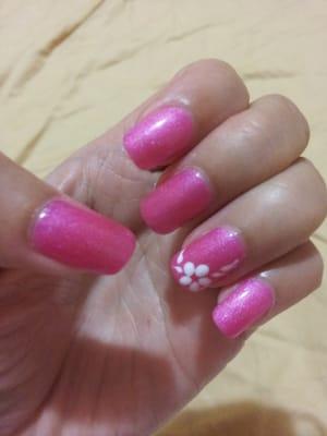 Pink polish with hand drawn flower.