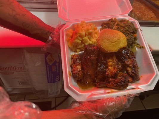 BBQ rib tips macaroni and cheese greens and cornbread muffins