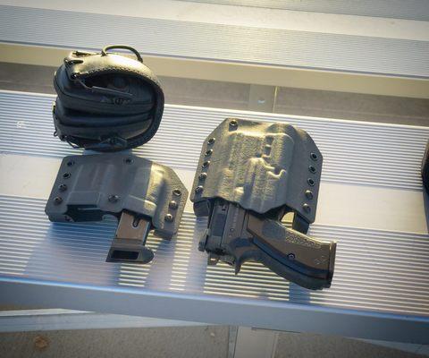 Custom kydex holster and pouch from Off the Grid Concepts. Highly recommend them.