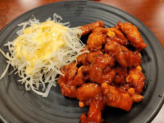 The rubbery mess of chicken coated with Ketchup, not even breaded and fried. They call this junk Crispy Korean Fried Chicken.