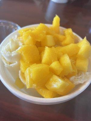 Mango Rolled Ice Cream with fresh mango on top