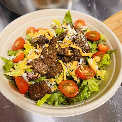 Our Beef Tenderloin with the freshest vegetables and our delicious dressing will make your day!