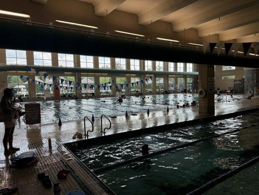 The swim team takes over the entire indoor swim area... both pools