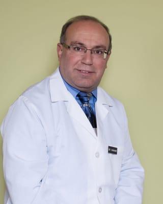 Dr. Hikmat Hannawi, DMD, DDS