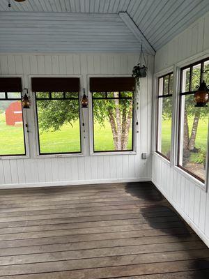 A empty three season room that I'm going to furnish it with furniture from Lowe's