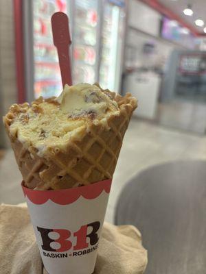 Pralines 'N Cream ice cream on a waffle cone.