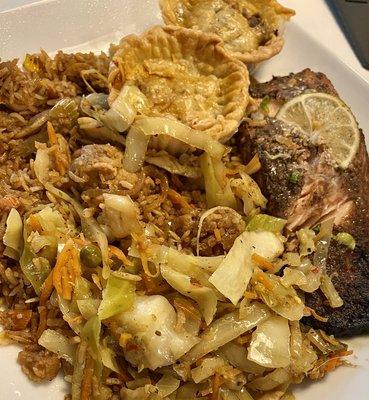 Ground Beef Patty Jerk Salmon Plate Cabbage Rice and Peas