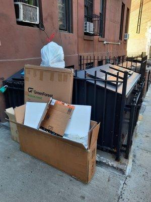 Nearly every Sunday, garbage are piled up in front of the building.