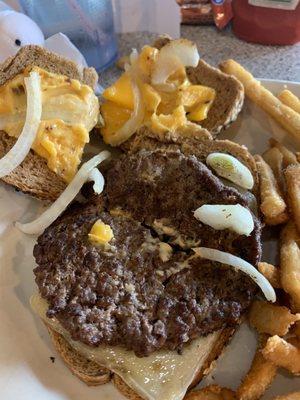 The patty melt with unmelted cheese  and 5 non-grilled onions.