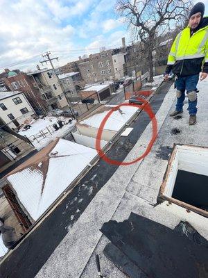 Clearly u can see where the leak is circled in red when the ripped the roofing off.