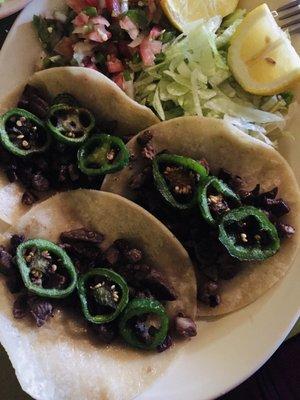 Asada tacos with grilled jalapeños