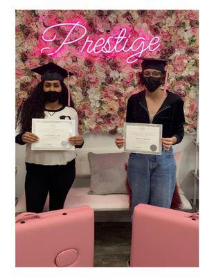 New flower wall and new grads for our lash extension Course!