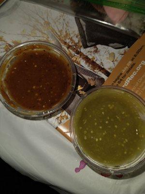 Two types of salsa one green not spicy and one red very good and spicy