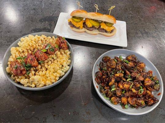 Gouda Mac & Cheese with bacon wrapped quail, sliders & honey balsamic glazed Brussel sprouts