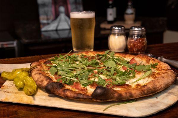 The Bigfoot - Extra virgin olive oil drizzle, shredded mozzarella, prosciutto, fresh garlic, arugula