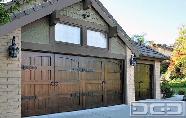 Spanish Colonial Garage Door Design With Decorative Iron Hardware by Dynamic Garage Door