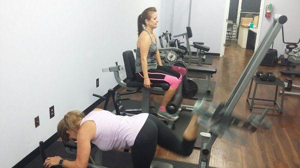 Clients working on their lower body.