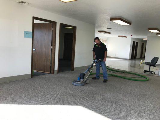 Tom Miller, owner of SERVPRO of Montrose / Telluride performing a volunteer carpet cleaning job at the Welcome Home Montrose ...