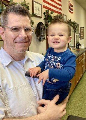 Barber Sean & Bash. This boy is happy with his haircut!