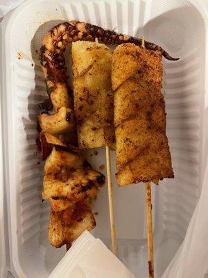 Barbecued squid skewer ($3), rice cake skewers (2 per order, $3)