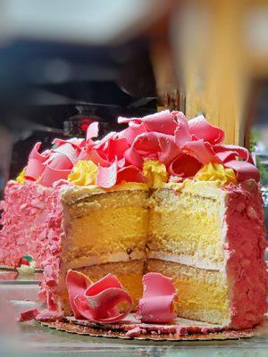 Madonna Inn's famous Pink Champagne cake (tower of buttercream, pink chocolate shavings and fluffy white cake).