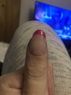 This is my half thumb nail that was filed to this shape by the nail technician.