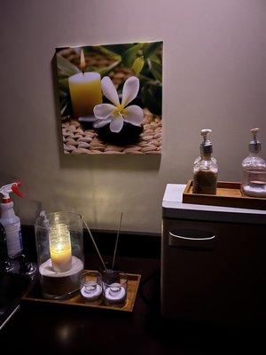 Lighting the unity candle before the massage and setting intentions.