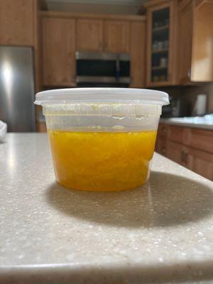 Half full container of Egg Drop Soup