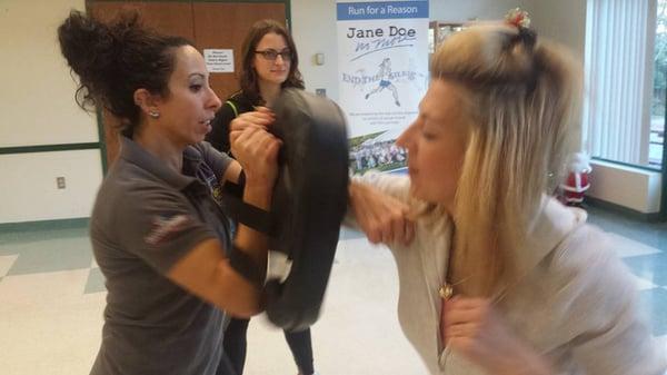 Escape Alive Instructor Tracy DiGiovancarlo teaching participant at a recent class.