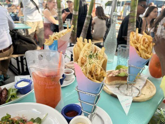 Truffle Fries, Old Bay Fries, Lobster Roll and Kiwi West Cocktail Pouch