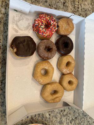 Example of what our donuts looked like this morning. A dozen of their donuts used to barely fit in the box.