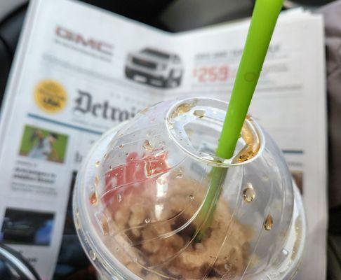 Coke slurpee and Detroit Free Press newspaper