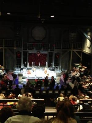 Photo of the theater from near the top of the audience seating - set up for an acoustic holiday concert