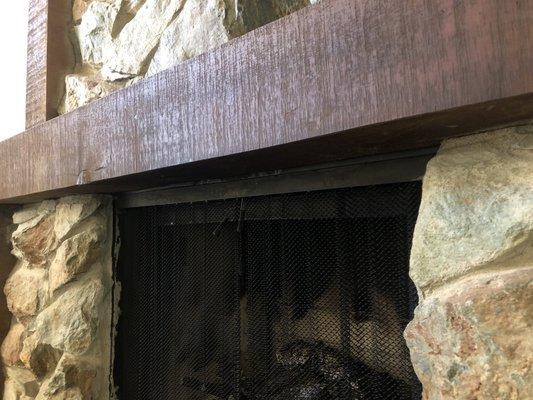 Wooden Mantle touching firebox