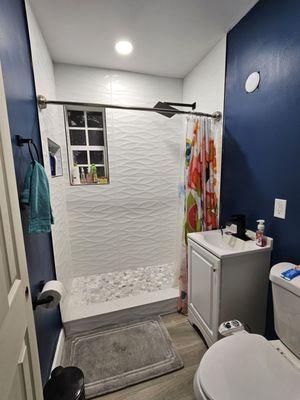 Full bathroom remodel! Medicine cabinet and light fixture hadn't been installed yet, but everything else is good to go.