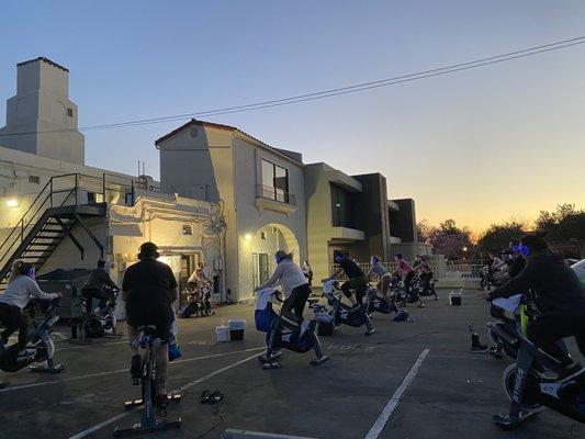 Socially distanced outdoor classes. Bikes are spread at least 8ft apart.