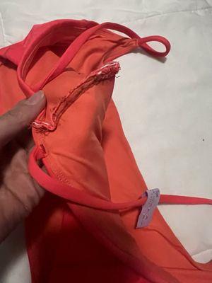 Swim top 2, inside seam with shoddy stitching and scratchy part that is somehow supposed to lie flat against my bare skin?