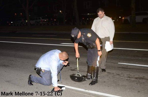 Criminal Def. Atty Uriel observing the work of the NYPD at the scene of a vehicular collision investigation.