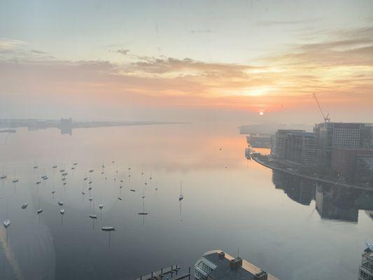 Midwinter sunrise, boats dreaming of summer. 

- Boston Harbor Sailing Club