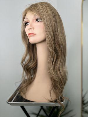 Russian Human Hair wig light brown some a sun kissed highlights.