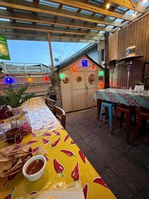 cool enclosed patio out back