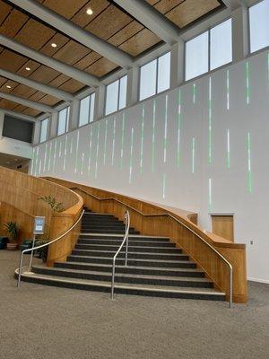 Grandeous stair case with pretty and interesting neon art. 1/27/2023