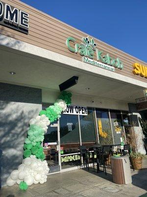 Storefront with festive balloons