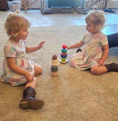 The twins got lots of new clothes AND toys!