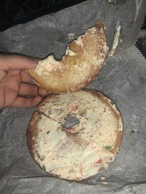 Barely any veggie cream cheese on my bagel. I definitely feel cheated and disappointed in my breakfast.