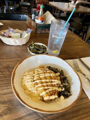 Catfish bowl with turnip greens and grits